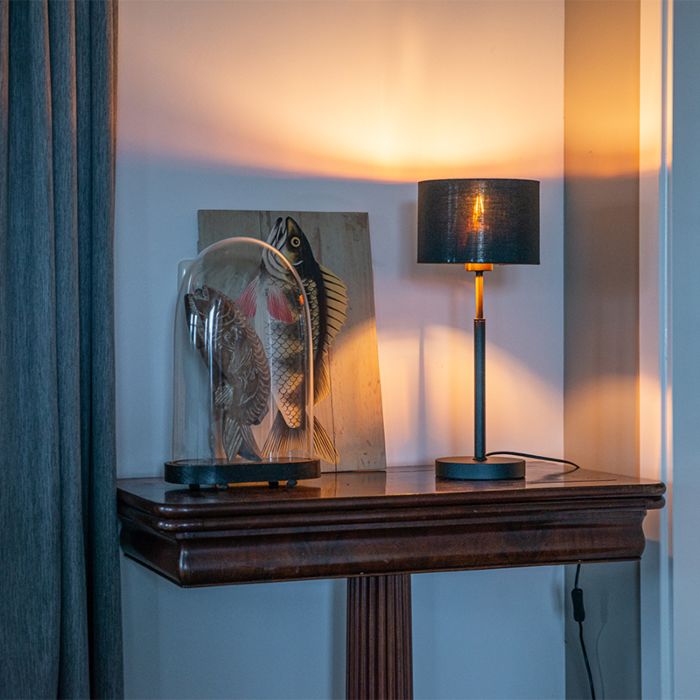 Moderne Tischlampe mit Stoffschirm in Schwarz und Gold, rund